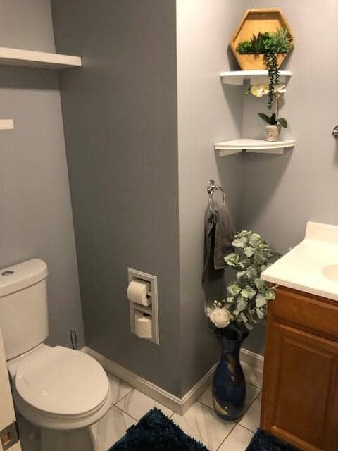 Brentwood BRE-22-W double toilet paper holder installed in bathroom setting