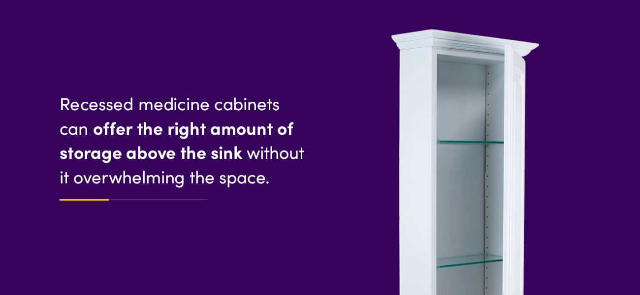 recessed medicine cabinet offers storage above the sink